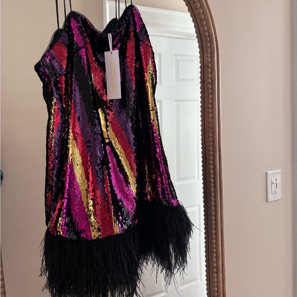 Rebecca Vallance sequin dressed with feathered hem/bottom size 10